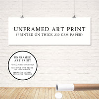 a white brick wall with a sign that says unframed art print printed on